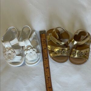 Two White and Gold baby sandals